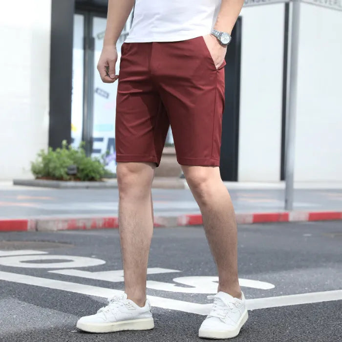 Men's mid-length fifth pants with elastic waistband in solid colour options