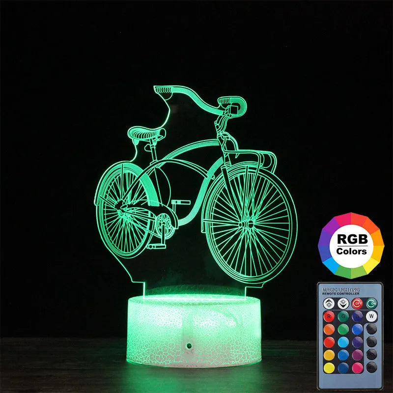 3D bicycle night light with LED acrylic shade on black base against a dark background