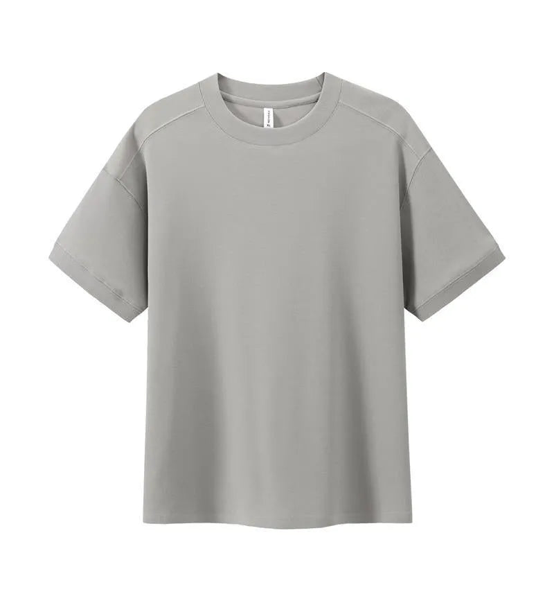 Short-sleeved loose-fit cotton pique T-shirt for youth in solid colour options