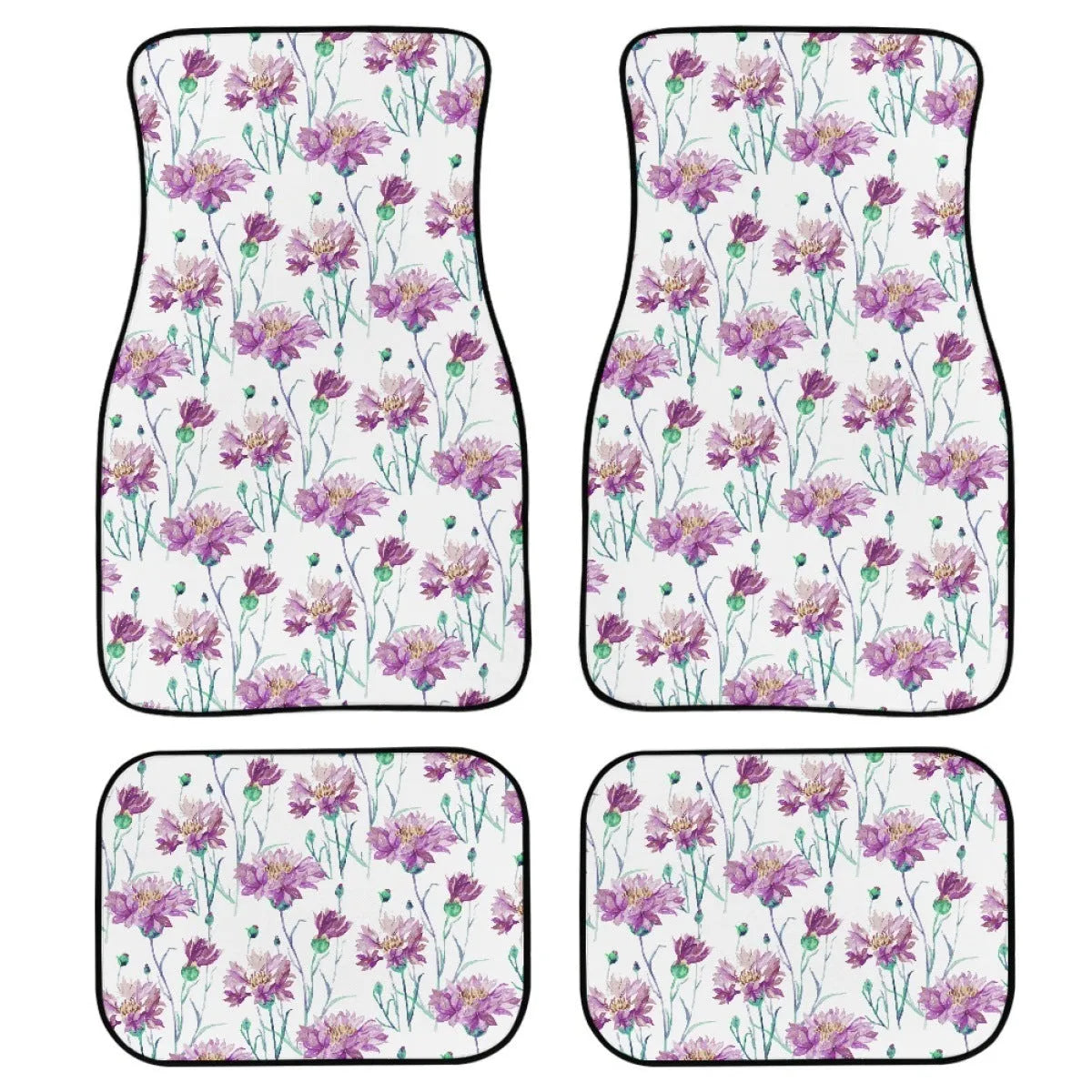 Set of four black printed rubber car floor mats with textured surface, showing thickness.