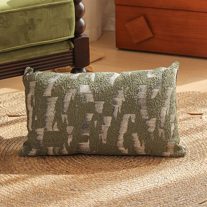 Close-up of a 45cm square jacquard cushion cover with a woven floral pattern in retro Nordic style.