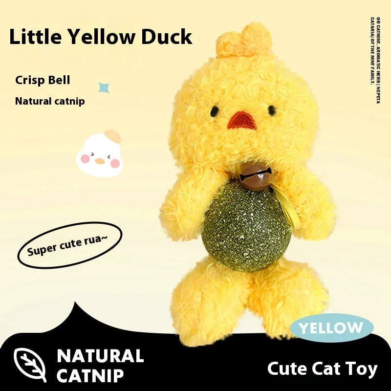 Plush catnip toy shaped like a character, showing scale next to a 4cm mint ball, with a bell visible inside.