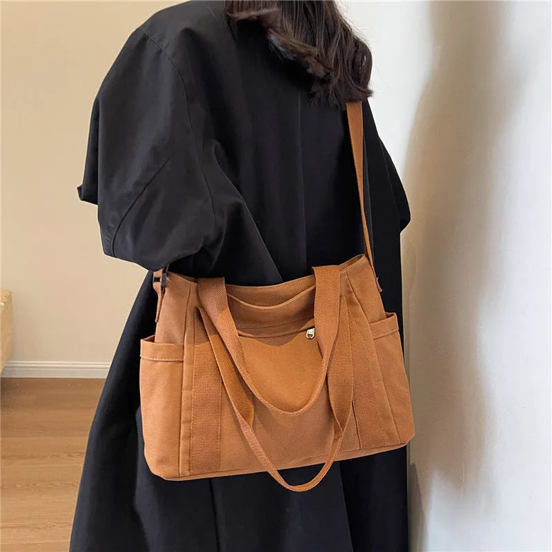 Women's polyester canvas shoulder tote bag with large capacity and internal mobile phone pocket storage