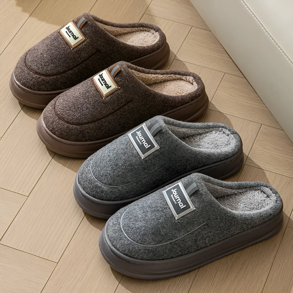 Men's brown and grey suede slippers with a thickened sole, shown from the side.