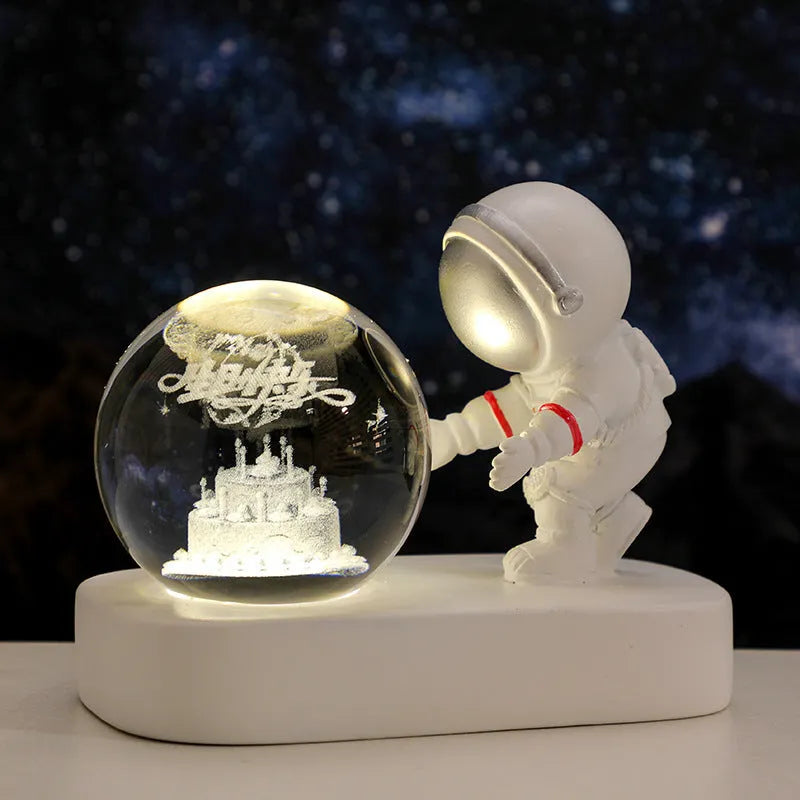 6cm crystal ball night light with USB cable showing detailed planetary and astronaut 3D designs