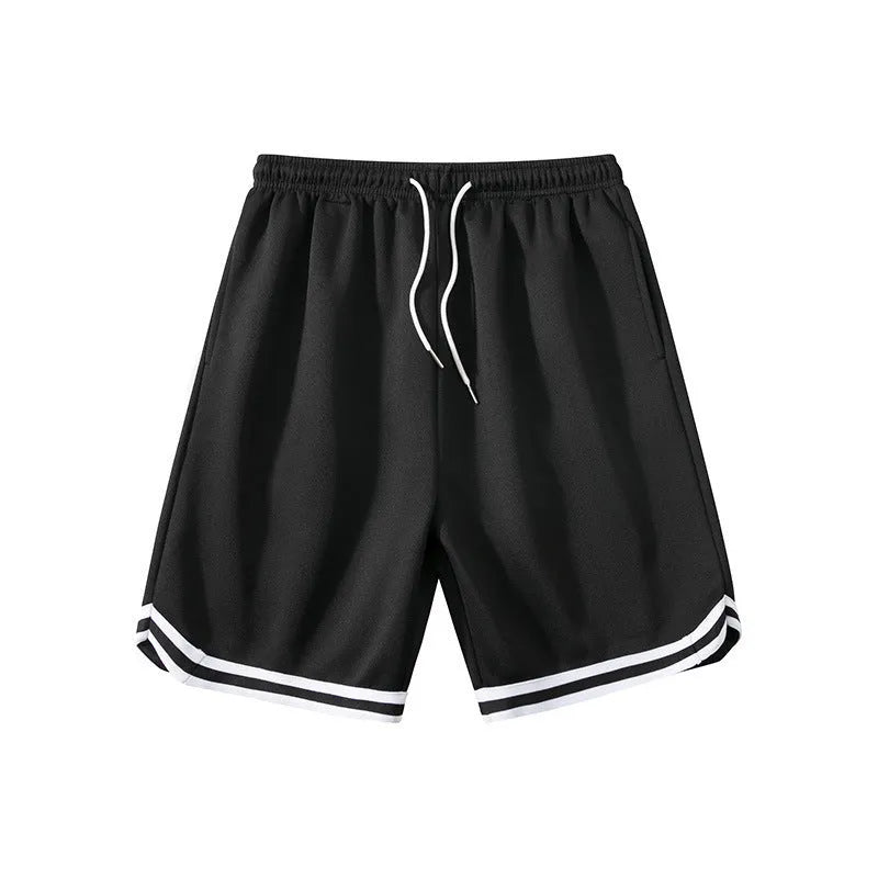 Men's loose-fit polyester sports shorts in apricot colour on a grey background.