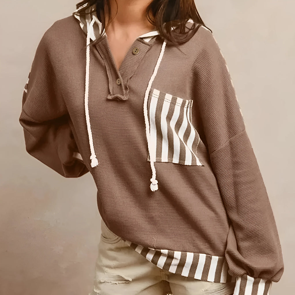 Straw yellow waffle texture hoodie with striped patchwork and button neck closure
