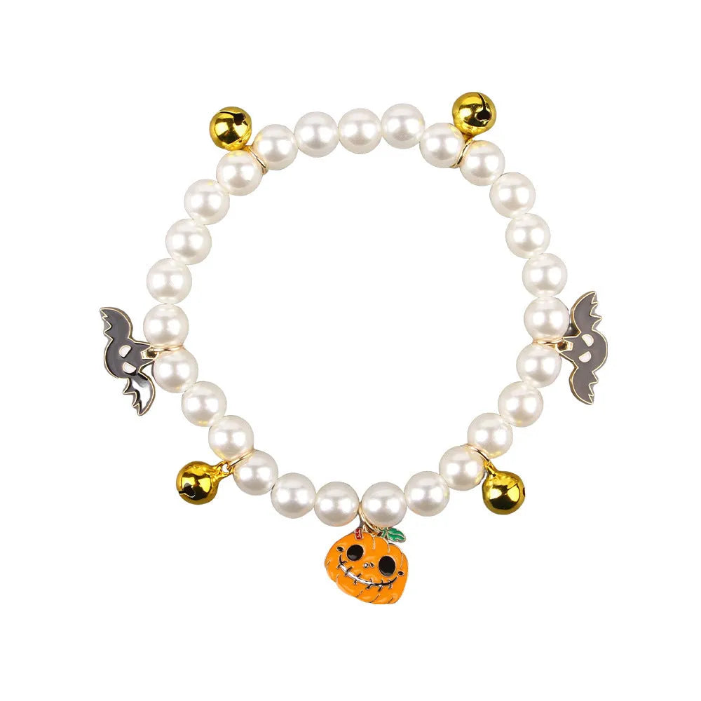 Halloween cat collar with simulated pearl beads and purple pumpkin charm decoration
