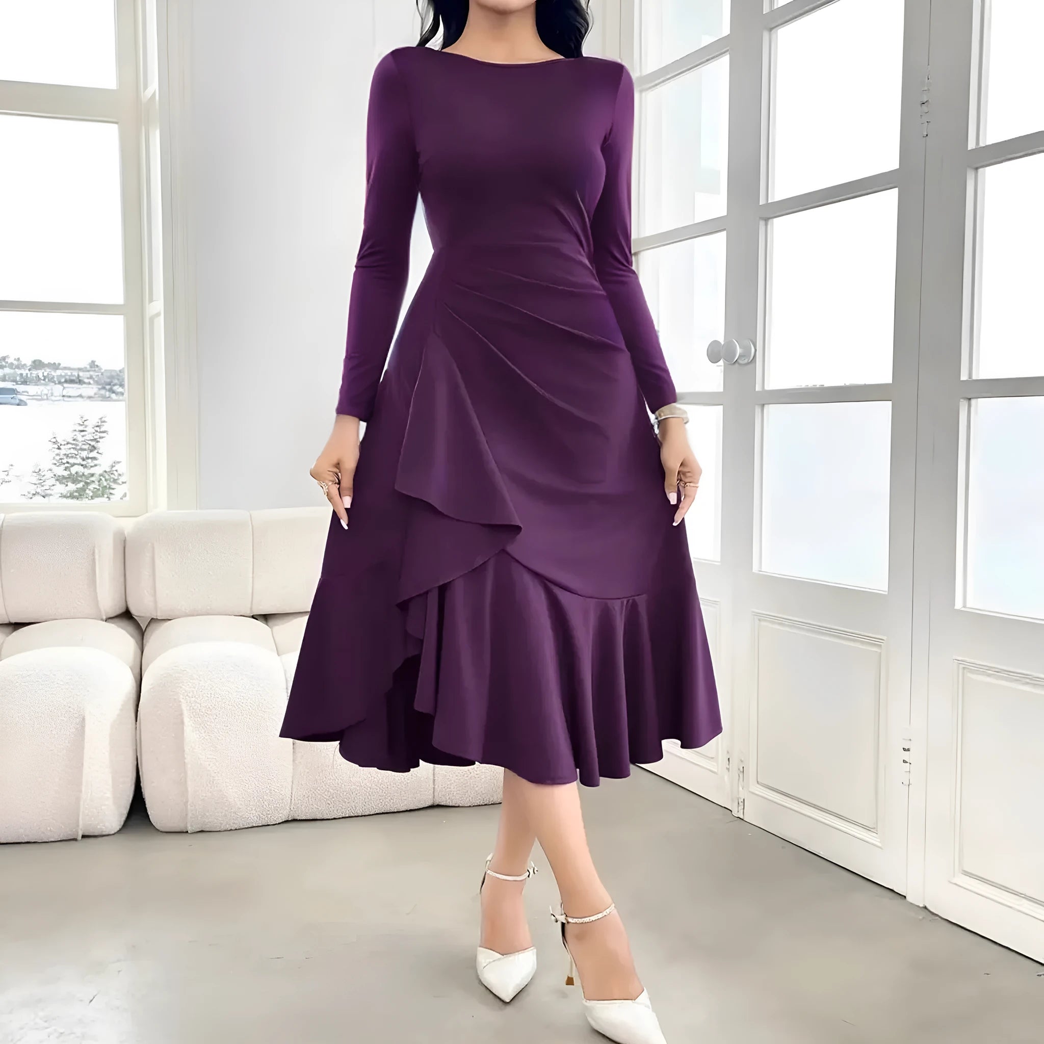 Purple women's long sleeve dress with round neck and ruffle detail on a hanger