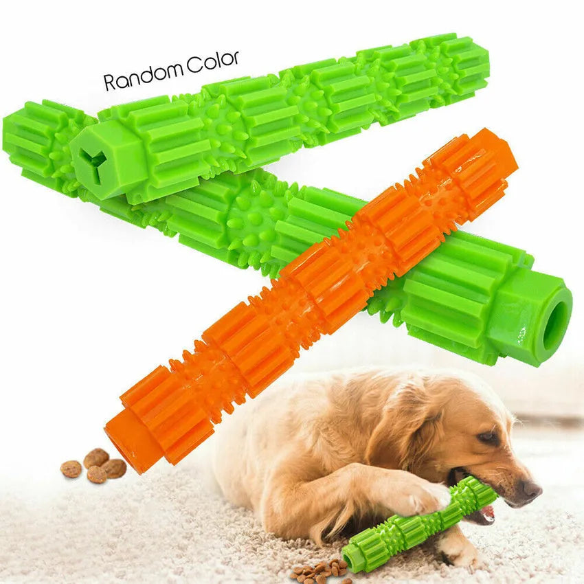 Green and orange rubber dog chew toy with treat dispensing hole and textured surface