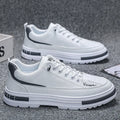 Men's white low-top platform sneakers with round toe and elastic band design on a plain background.