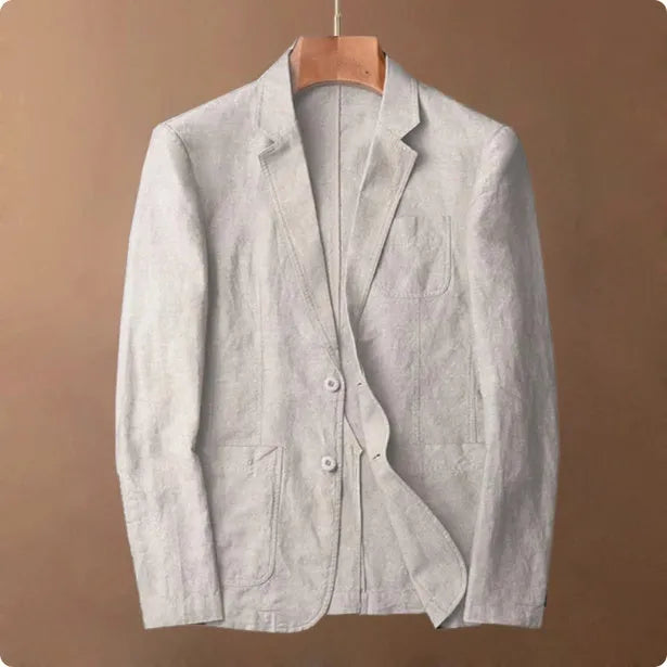 Men's solid colour linen suit jacket on a hanger, showing single-breasted front and size stick pocket detail.