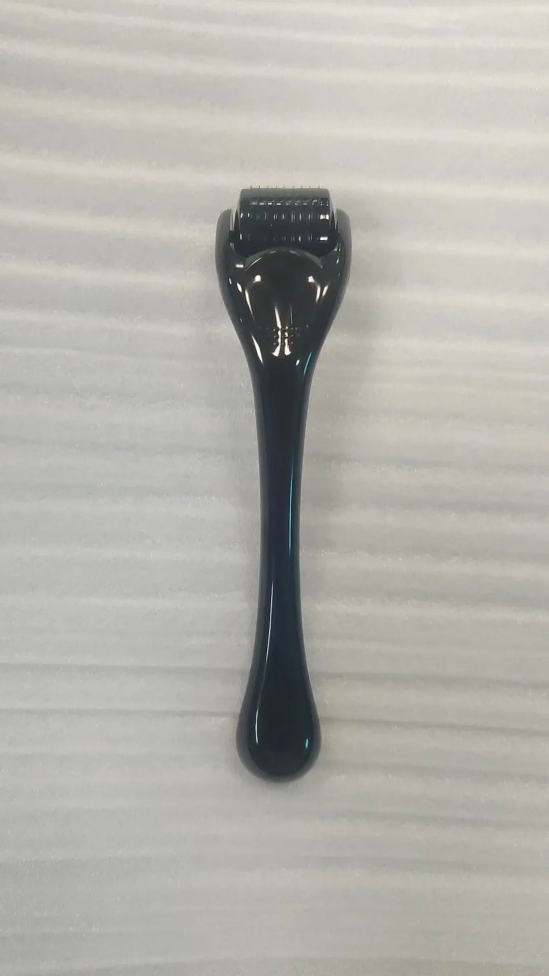 540 micro needle mechanical derma roller with black handle and coloured wheel options