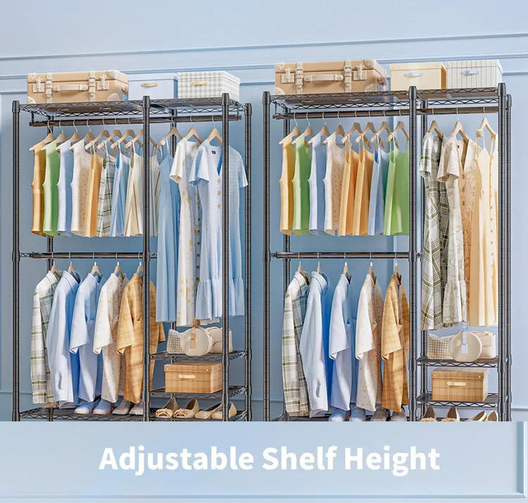 Black floor standing metal clothes storage rack with garments hanging