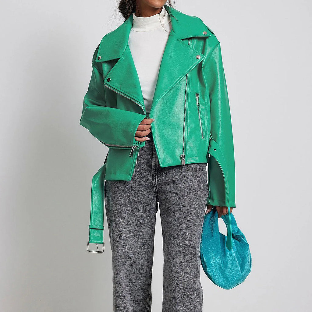 Punk short black jacket with lapel, belt, and Peter Pan collar on a model.