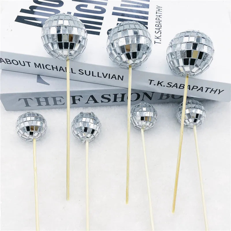 Glass disco ball cake decoration on wooden stick in various sizes for birthday party cakes