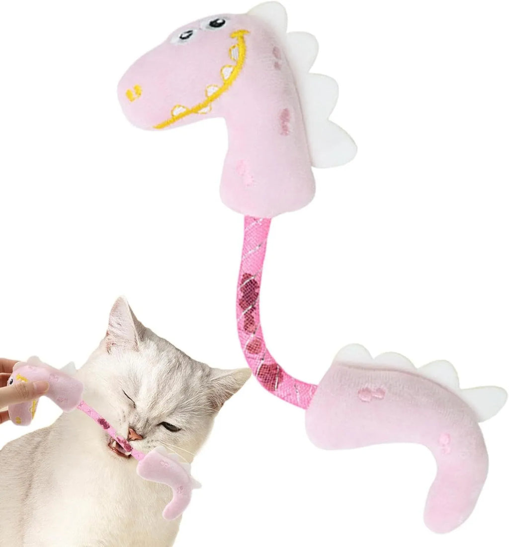 Set of cat toys including plush animals, rope toys, and springs on a pink background