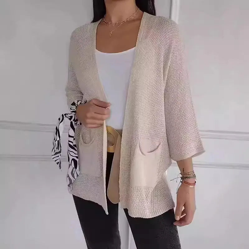 Women's waffle knit cardigan coat in apricot colour with nine-quarter sleeves and side pockets