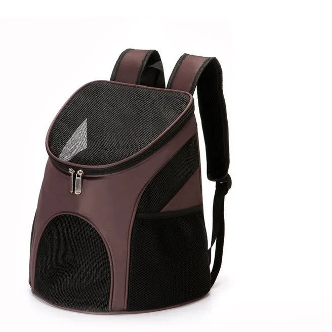 Red pet backpack carrier for a small dog, shown as a portable outing bag.
