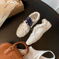 Women's retro German-style training casual shoes in artificial PU with flat heel and lace-up front.