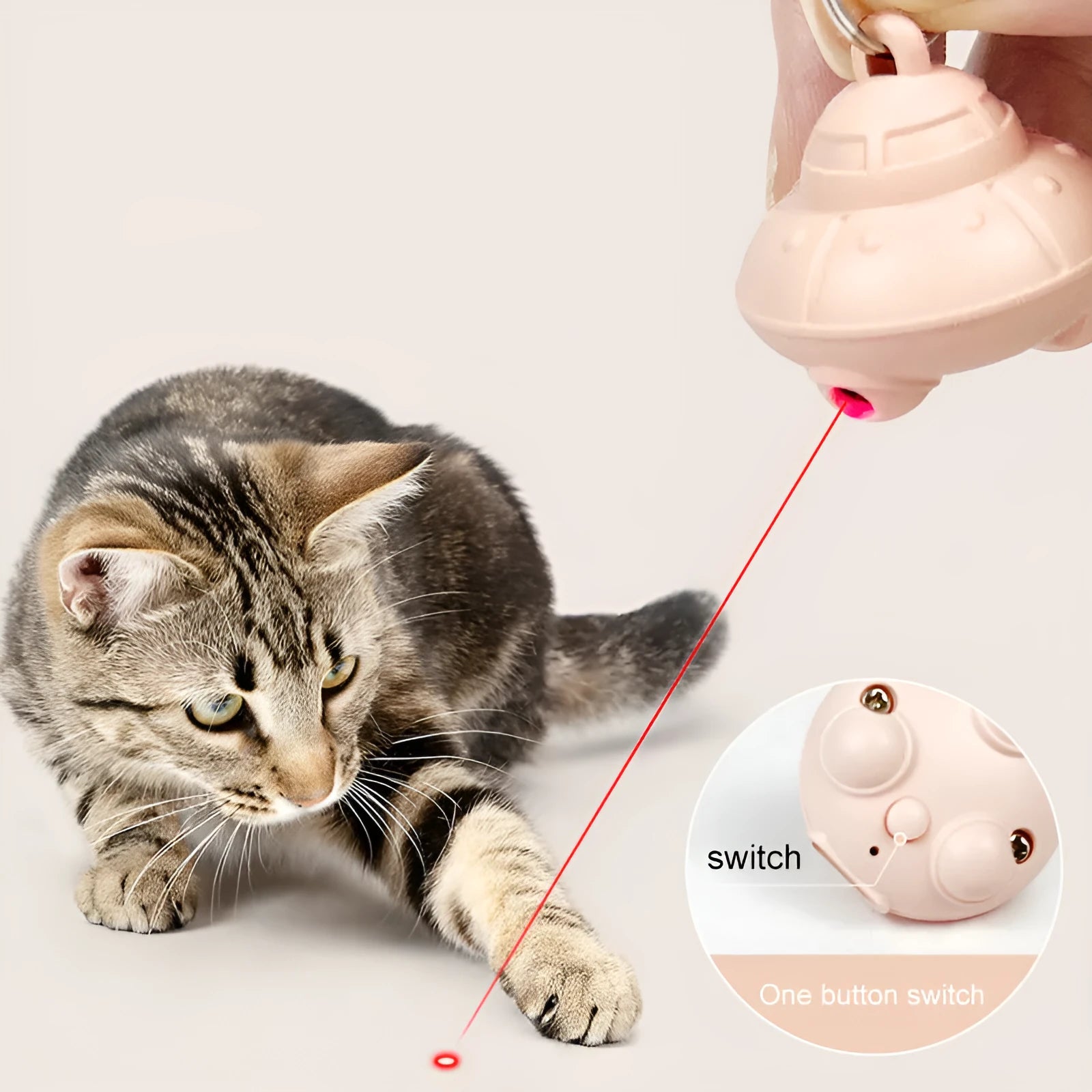 Green cat collar laser toy showing USB charging port and rotating mechanism