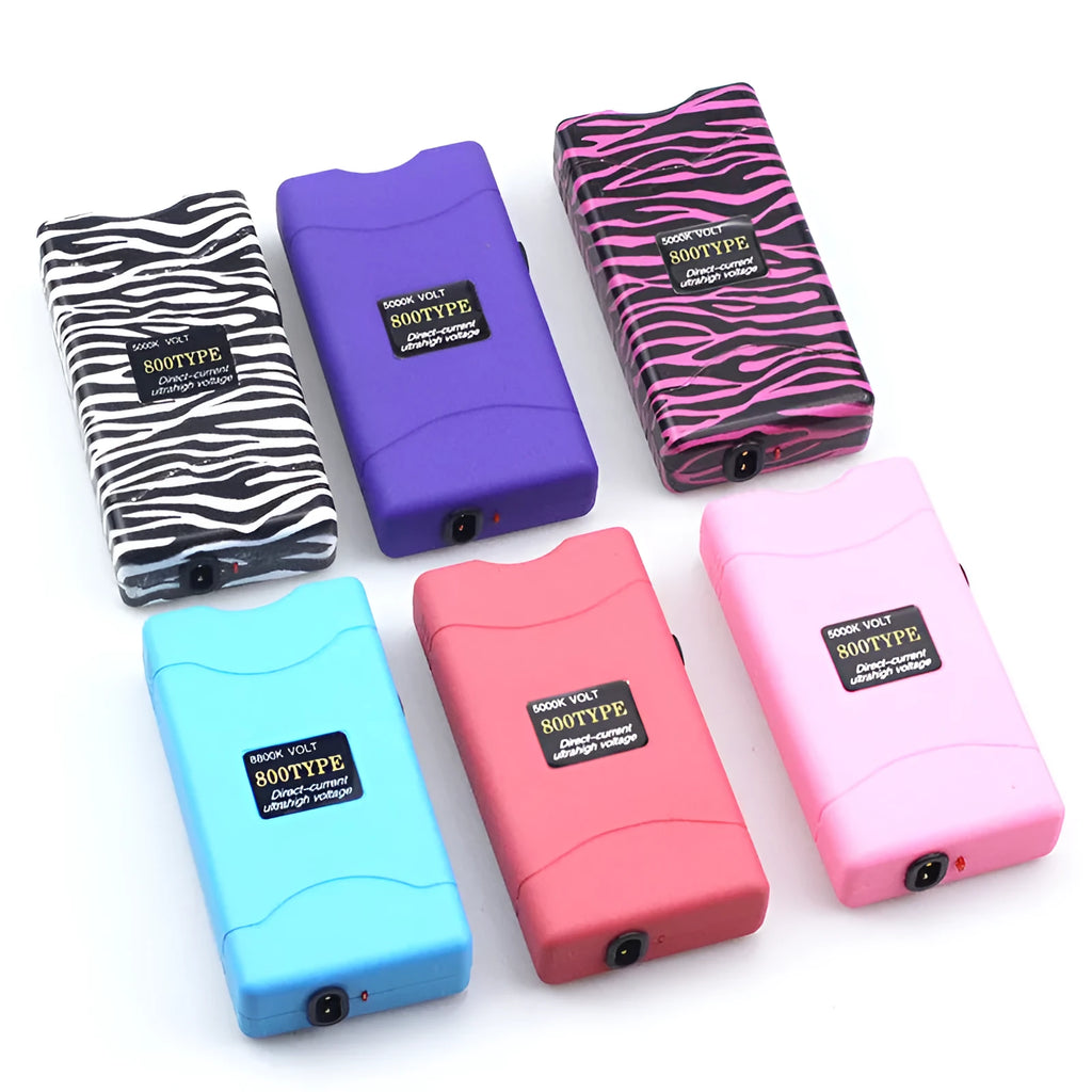Female self-defence multi-function flashlight showing plastic resin construction in various colour options