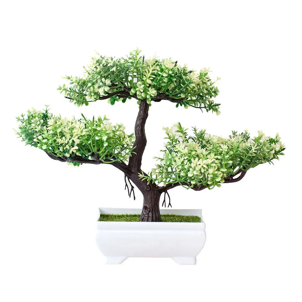 Artificial plastic flower bouquet in bonsai potted plant style with pink and white blooms