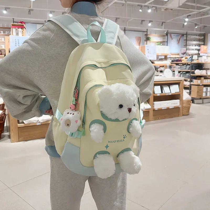 Literary style school backpack in macaron colours with curved shoulder straps and 20-35L capacity