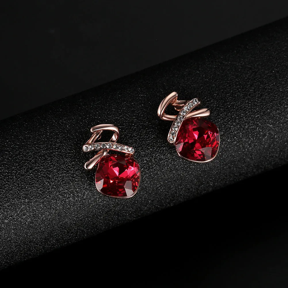 Women's alloy necklace and earring set with diamond-look finish on an adjustable water wave chain.