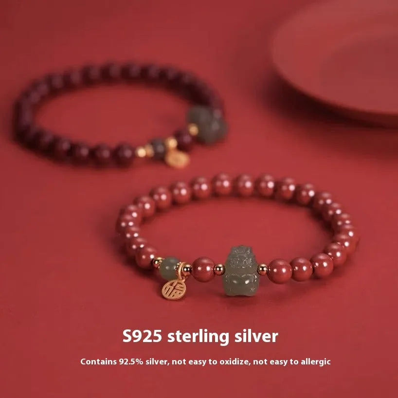 Natural Hetian jade cinnabar bracelet with 8mm beads and zodiac carvings