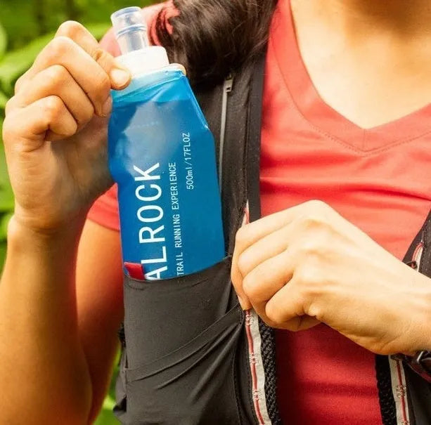 Durable plastic portable hydration straw with suction tube for outdoor activities.