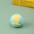 Handmade cotton cat hair ball plush toy in blue, green, and pink colour combinations, size 5 cm.