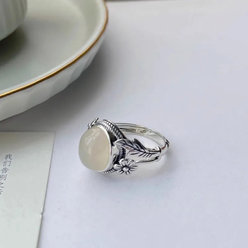 Copper vintage ring with white chalcedony imitation stone and adjustable opening mechanism