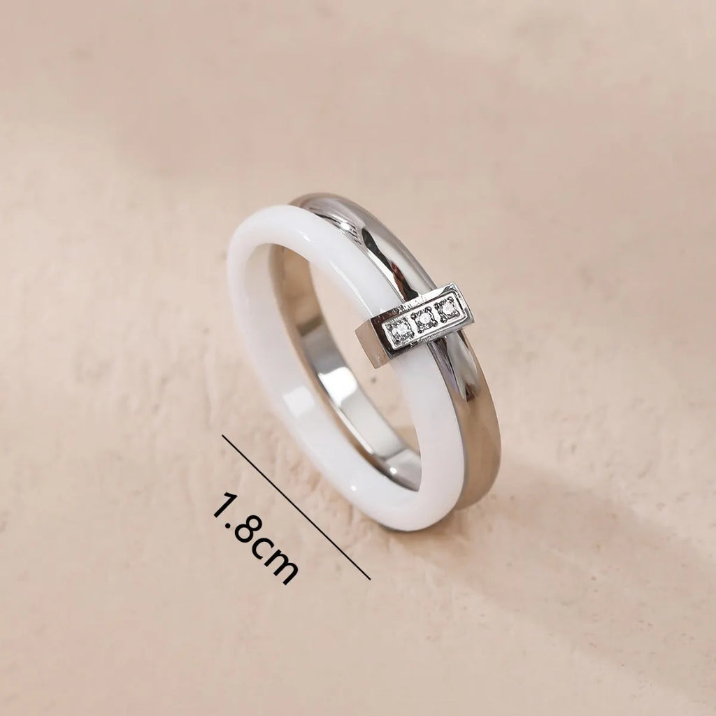 Women's titanium steel heart-shaped double ring with zirconium stones in three metallic colour options
