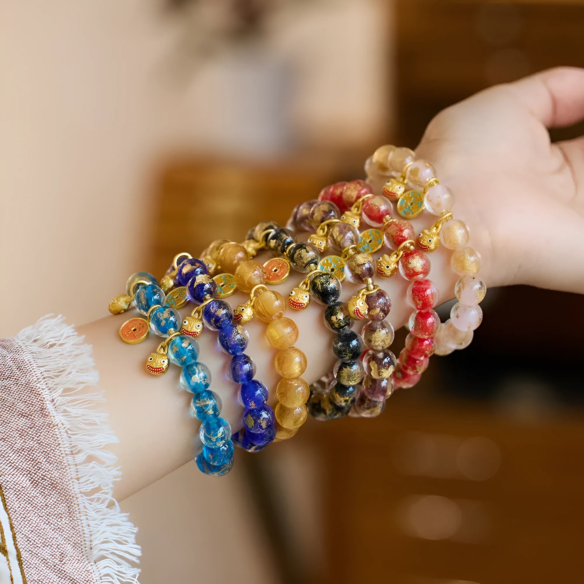 Handmade national style glass coloured glaze swallowing gold beast bracelet in fragrant grey with gold foil accents