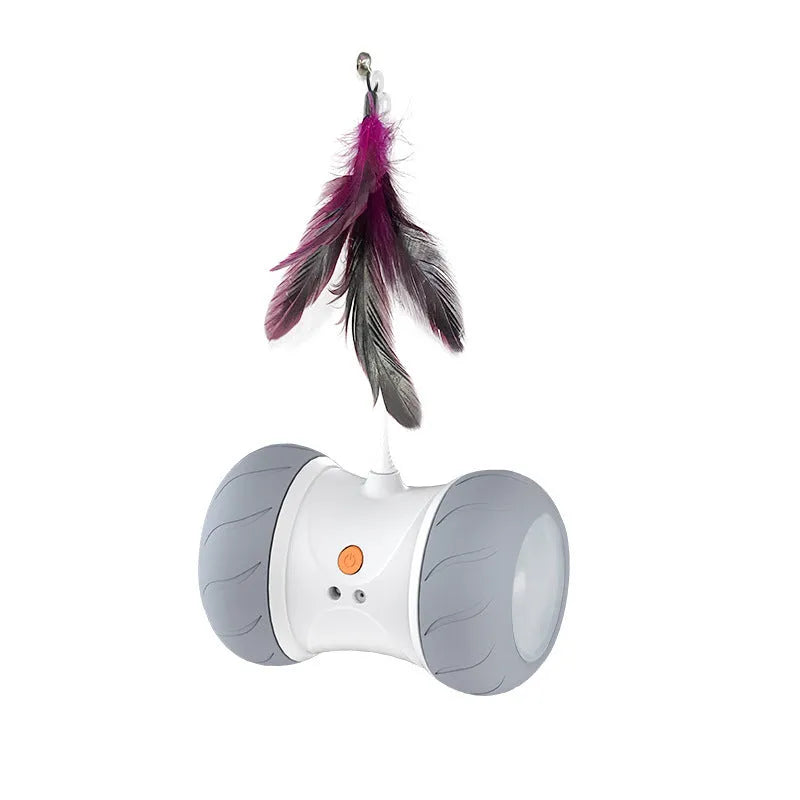 White light grey automatic electric roller tumbler cat toy on floor, ABS plastic construction