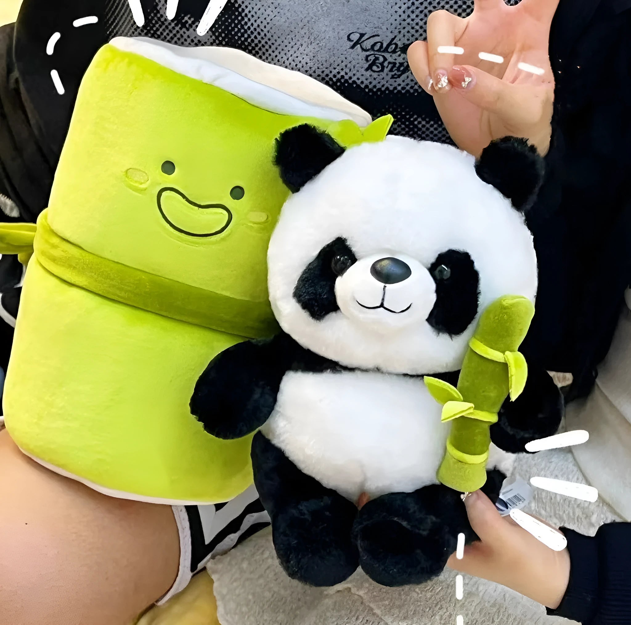 Panda plush doll holding bamboo shoots in bamboo tube design with PP cotton filling