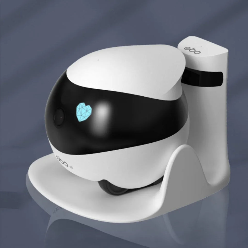 White mobile robot security camera with automatic docking station