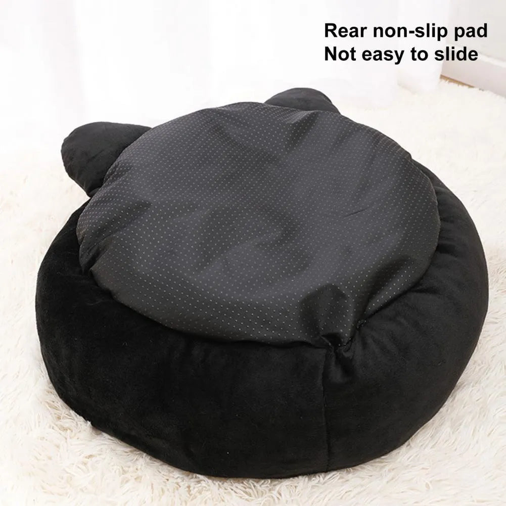 Black cat shaped velvet pet nest bed with raised edges for feline head and neck support