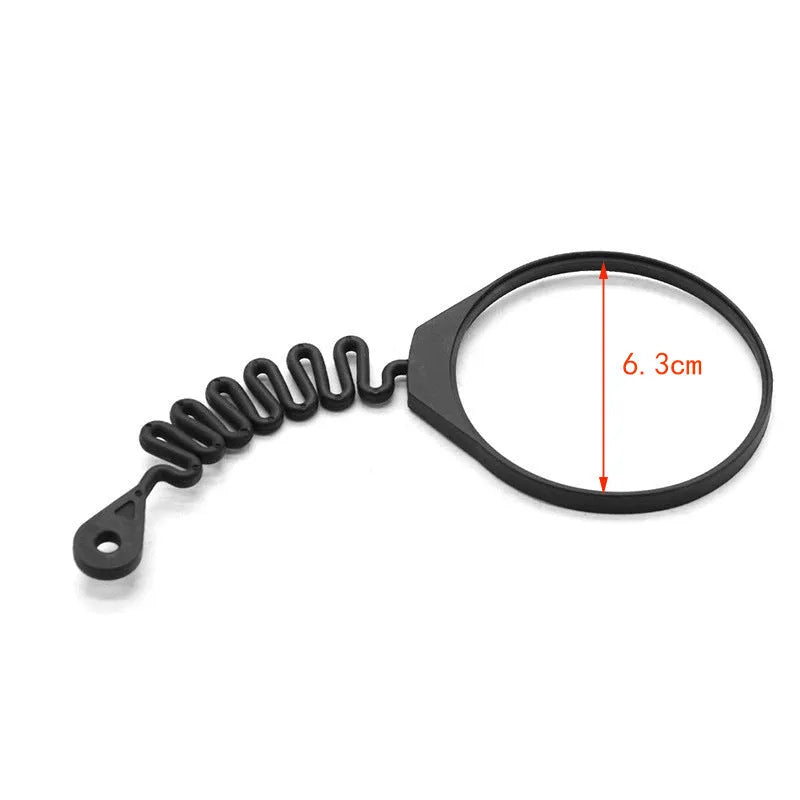 Black rubber Volvo fuel cap tether accessory showing circle band and separate rope designs