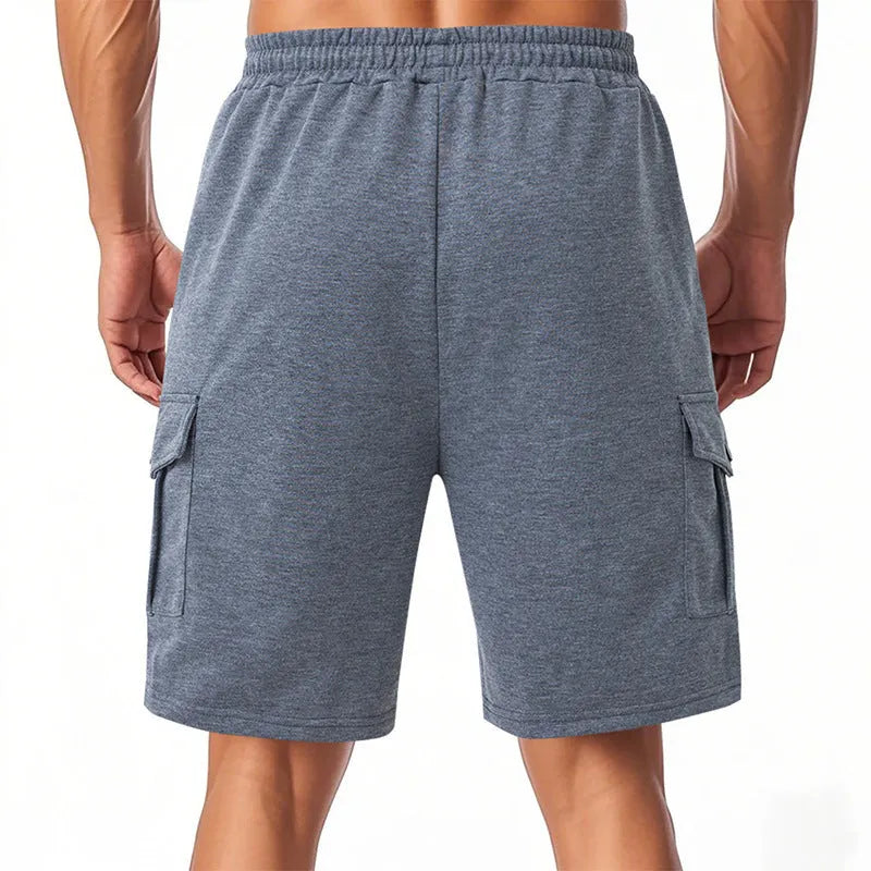 Heavy fabric cargo shorts with multiple pockets in loose sports style showing light grey colour option