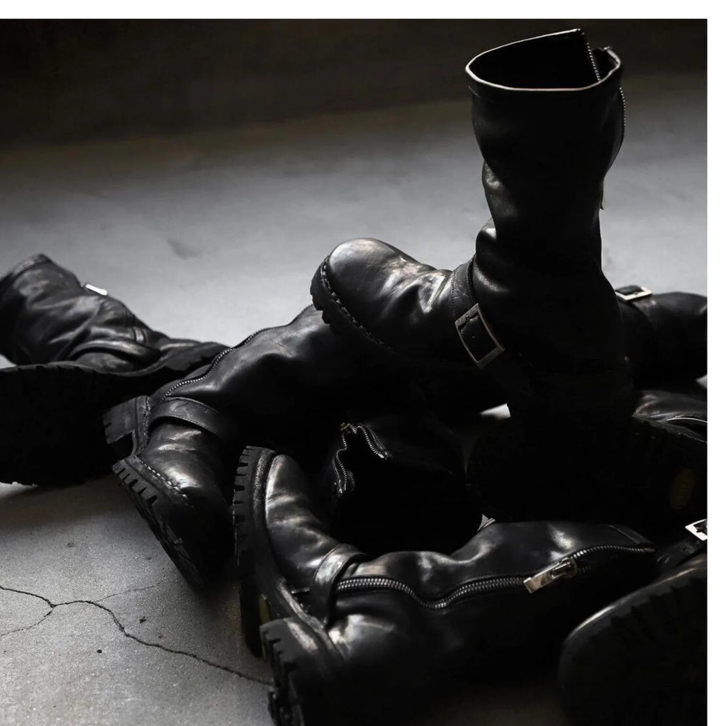 Men's dark retro ankle boots with a side zipper, shown in black.