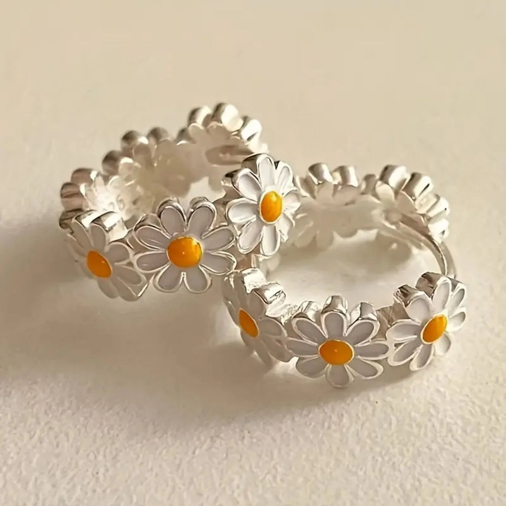White daisy flower ring earrings with electroplated finish and platinum gem detailing