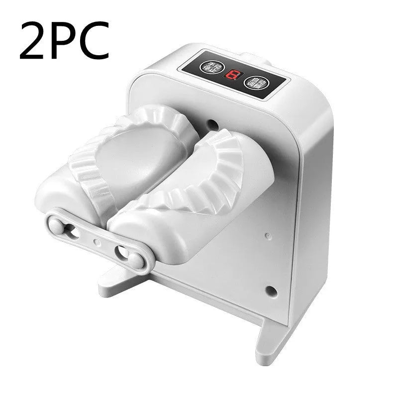 White electric dumpling maker machine with modern design on kitchen countertop