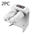 White electric dumpling maker machine with modern design on kitchen countertop