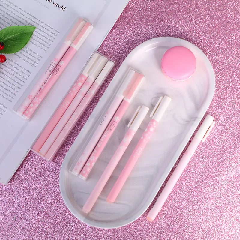 Sakura gel pen set showing plastic body pens with 0.5mm and 0.38mm needle tip options in boxed packaging