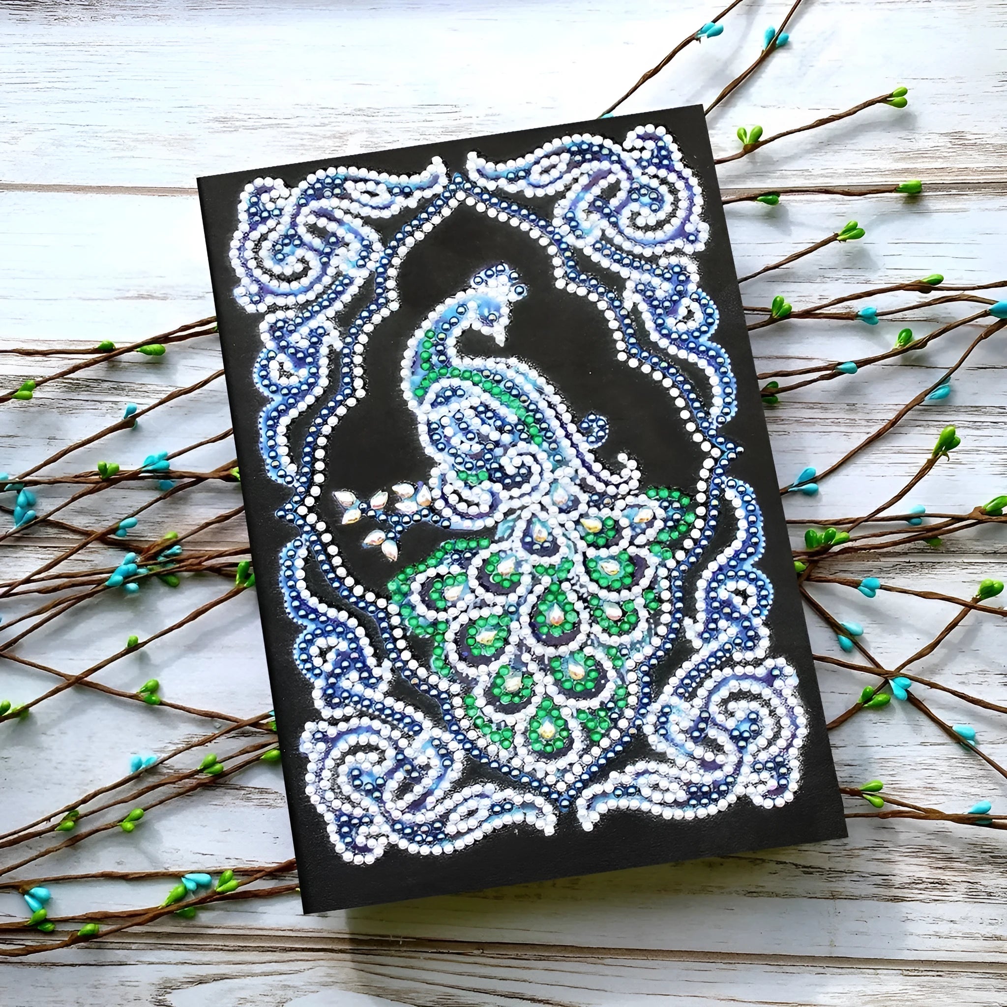 Black A5 hardcover diamond painting journal notebook for storing completed art.