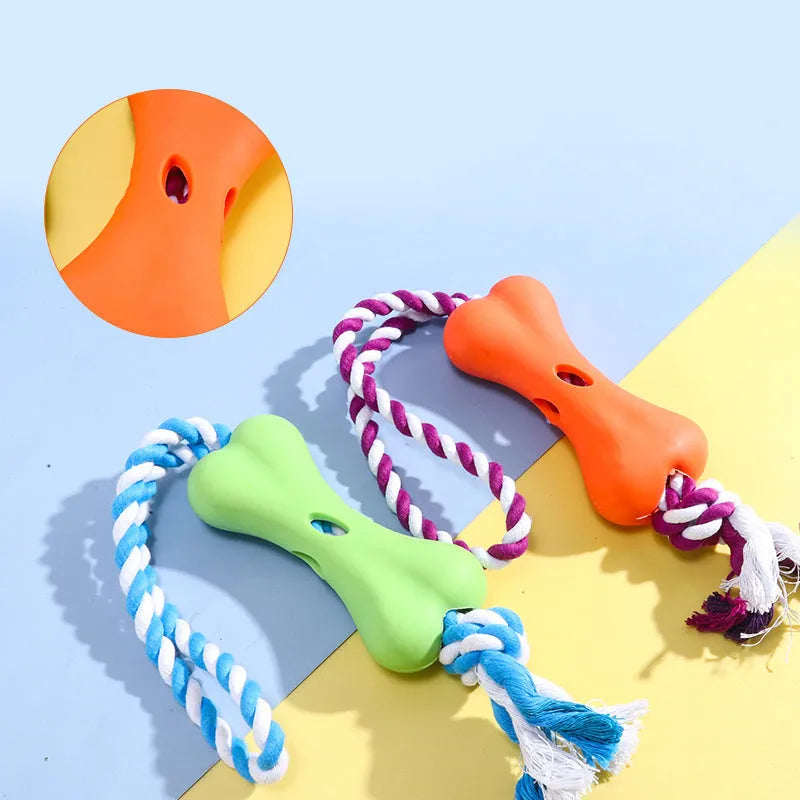 Small green bone-shaped rope knot dog toy with porous openings for treats