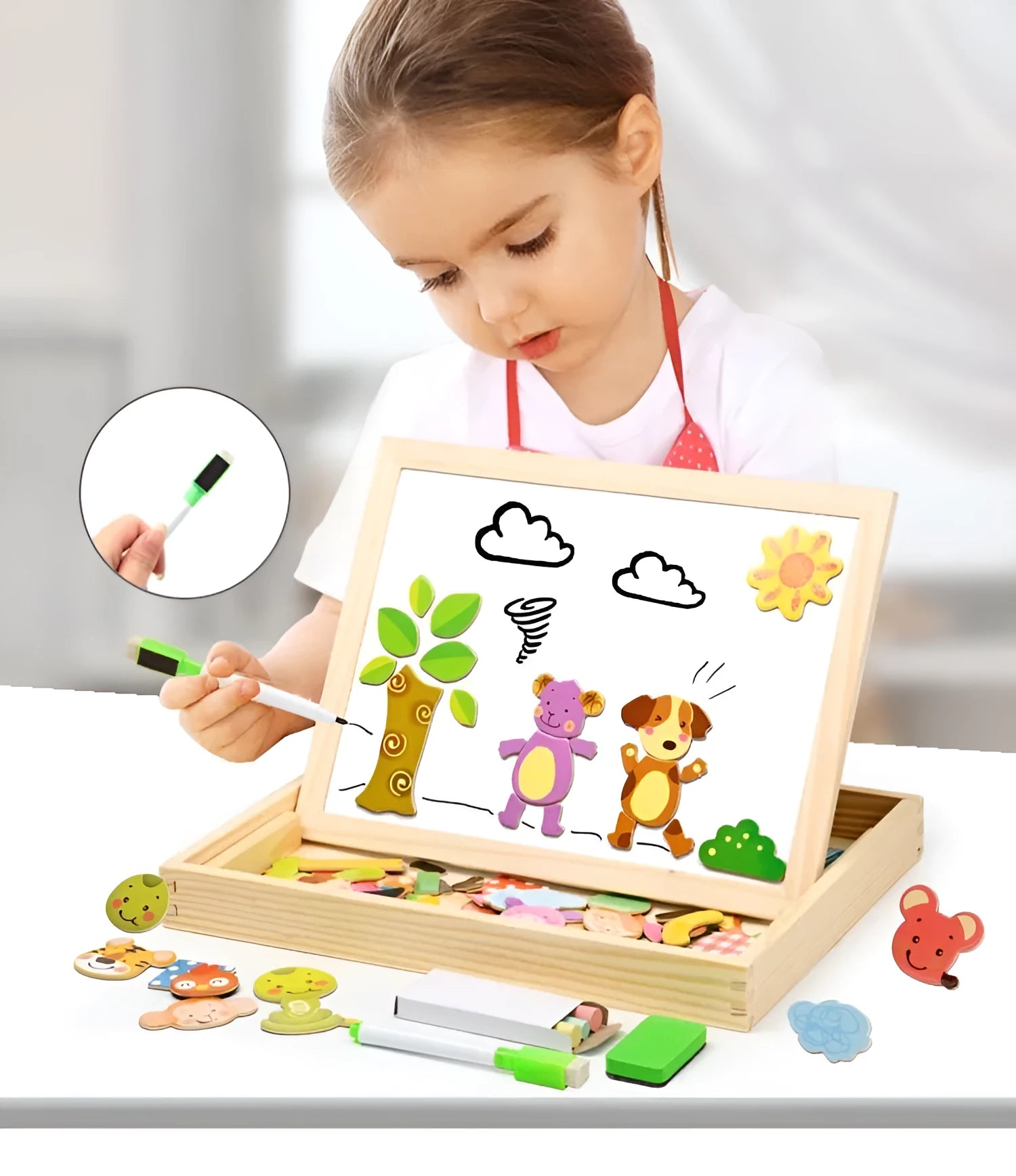 Wooden magnetic puzzle board with animal and vehicle pieces on drawing surface
