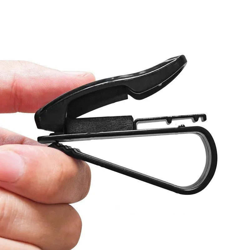 Black plastic car sun visor clip for glasses and cards measuring 6.5cm long